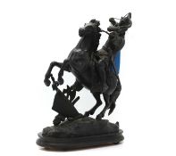 A spelter statue of an archer on horseback,