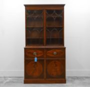 A George III mahogany and tulipwood banded secretaire bookcase,