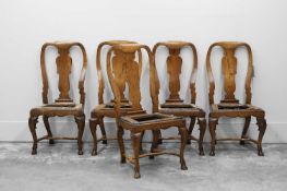 A set of five George I/II walnut chairs