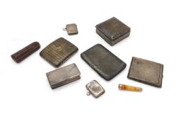 A group of silver cigarette cases,