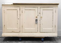 A large white painted kitchen cabinet,