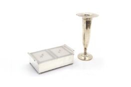 A silver table top cigarette box,
