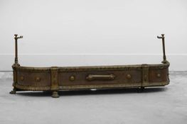 A steel and brass fire kerb,