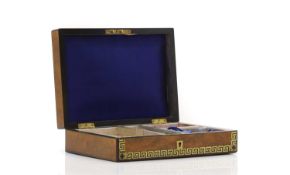 A Victorian walnut games box,