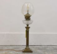 A Victorian oil lamp,