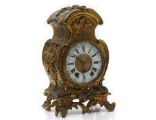 A gilt metal mantel clock,