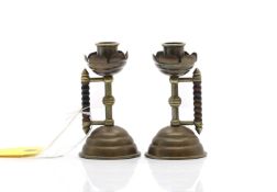 A pair brass tapersticks,
