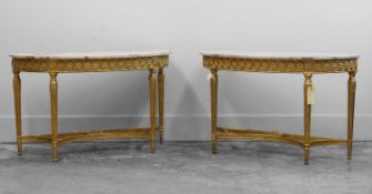 A pair of Adam-style giltwood console tables,