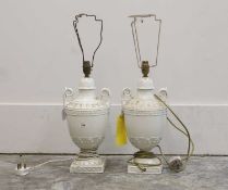 A pair of creamware style table lamps,