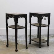 A pair of Chinese hardwood urn stands,