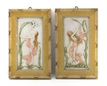 A pair of Art Nouveau porcelain plaques,