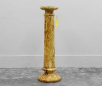 A marbled pottery ironic column form pedestal,
