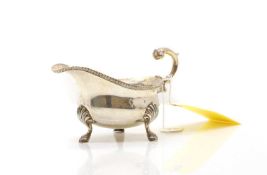 A silver gravy boat,