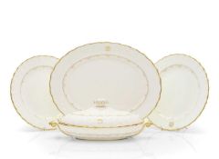A Royal Doulton white and gilt porcelain dinner service,