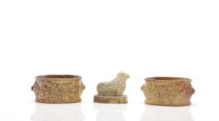 A pair of salt-glazed stoneware butter dishes,