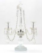 A cut glass candelabra,