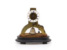 A French mantel clock, with glass dome,