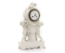 A bisque porcelain mantel clock,