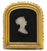 A pair of opaque glass silhouettes of Queen Victoria and Prince Albert,