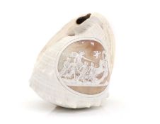A relief carved cameo conch shell,