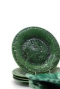 A collection of Wedgwood and Copeland leaf moulded plates,