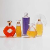 A group of Lalique glass scent bottles,