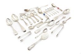 A collection of silver flatware,
