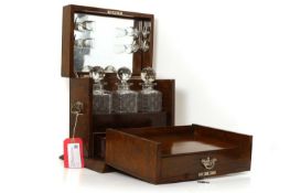 An oak cased tantalus,