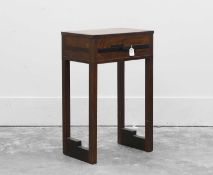 An Art Deco satined beech and ebonised lamp table,