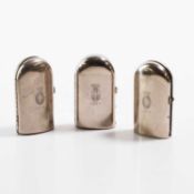 A group of three Coty glass scent bottles,