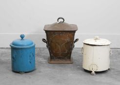 An Arts and Crafts embossed copper log bin and cover,