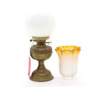 A brass oil lamp,