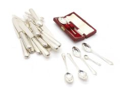 A collection of silver flatware,