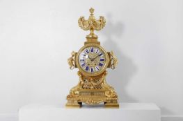 A Louis XIV-style gilt-bronze mantel clock,