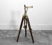 A mahogany and brass tripod converted to a lamp,