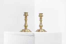 A pair of gilt-bronze candlesticks,