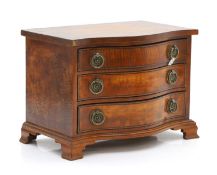 A George III style miniature fiddle back mahogany apprentice chest of drawers,