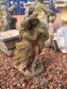 A reconstituted garden figure of lovers,