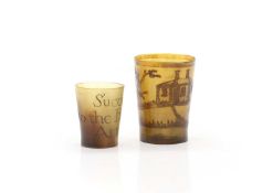 Two miniature horn beakers,