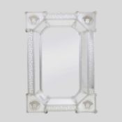 A Venetian-style glass mirror,