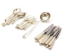 A collection of silver flatware,