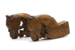 A pair of Indian teak brackets,