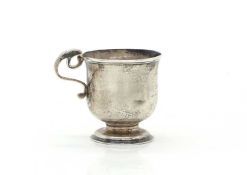 A small silver punch cup,