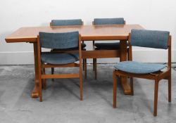 A Danish teak dining table and matched set of six chairs,