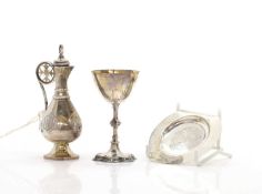 A cased silver communion set,
