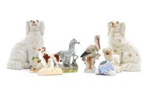 A collection of Staffordshire pottery figures,