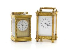 Two brass carriage timepieces,