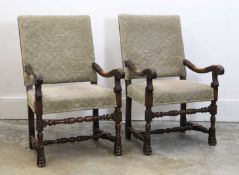 A pair of carved walnut open armchairs,