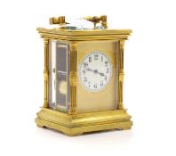 A brass cased carriage clock,