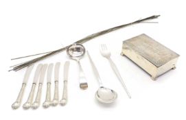 A collection of silver items,